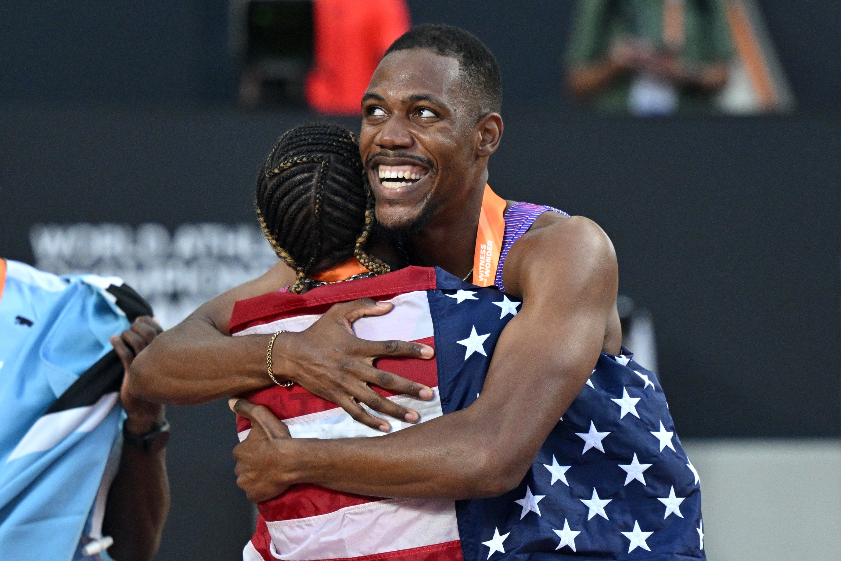 Gold medalist Noah Lyles of Team United States and bronze medalist Zharnel Hughes of Team Great Britain