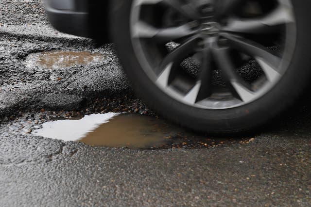 Wet weather in July caused the number of pothole-related breakdowns to jump by nearly a fifth, new figures suggest (Joe Giddens/PA)