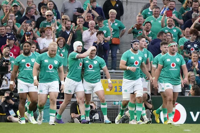 Keith Earls, centre, celebrates his try against England (Niall Carson/PA)