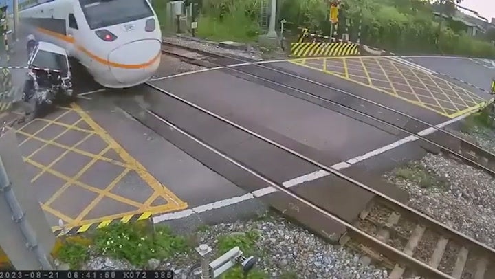 <p>Driver crashes into speeding train at level crossing in Taiwan.</p>