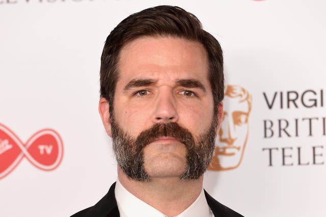 <p>Rob Delaney poses in the Winner's room  at the Virgin TV BAFTA Television Awards at The Royal Festival Hall on May 14, 2017</p>