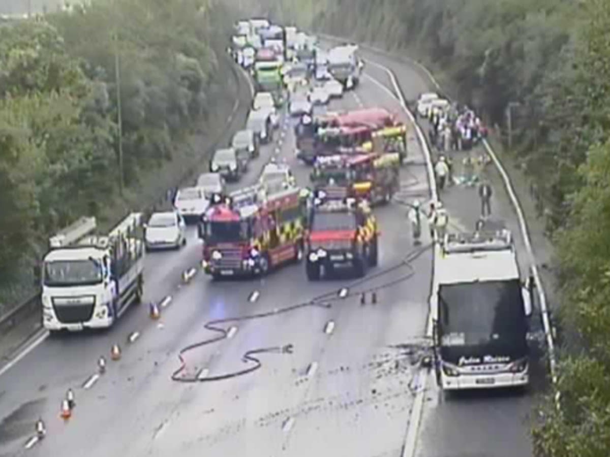 M25 fire: Coach bursts into flames on motorway bringing traffic to a ...