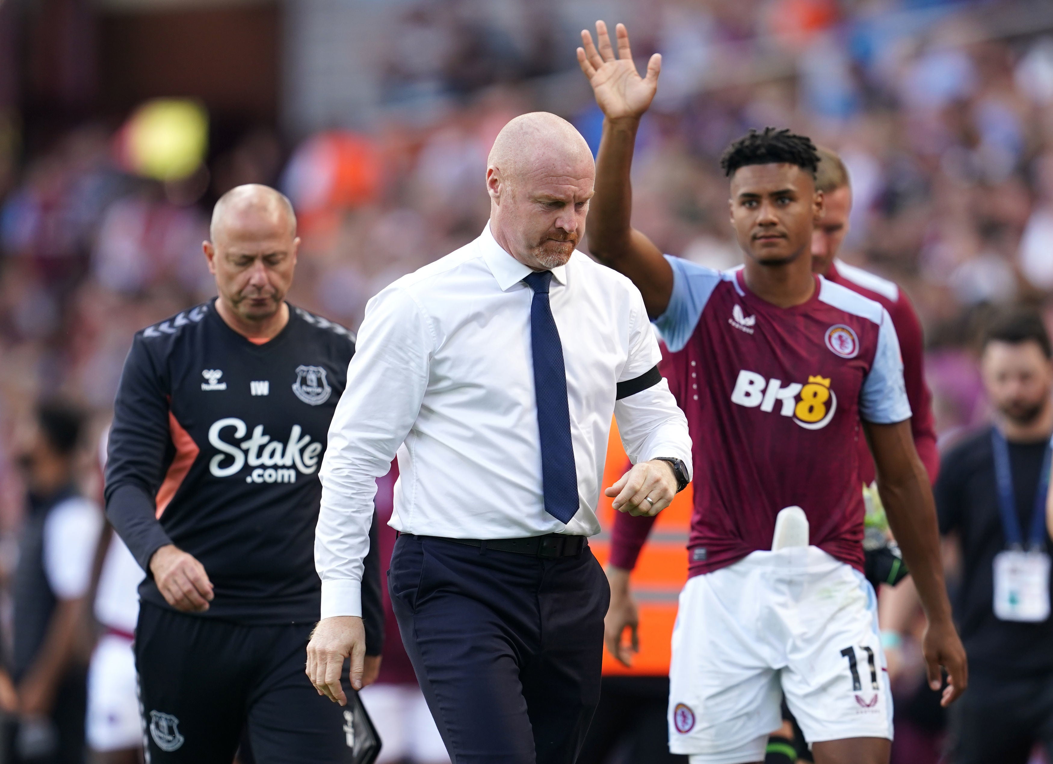 Sean Dyche, centre, cut a dejected figure after his Everton side lost at Villa Park