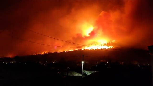 <p>Wildfires spread through Greek villages as residents evacuated.</p>