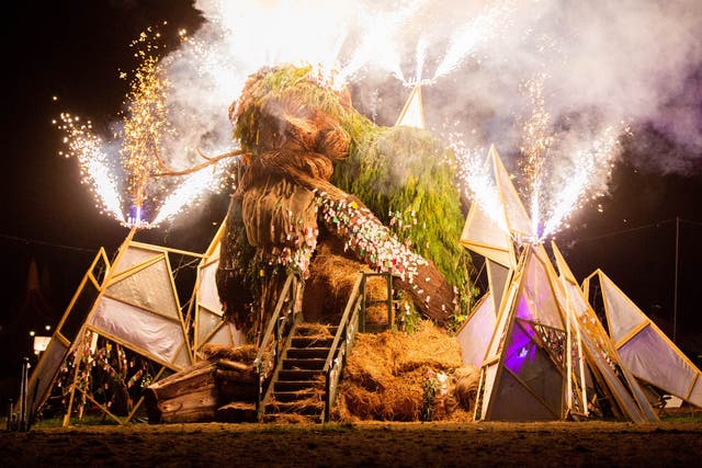 <p>The wicker man catches light in a barrage of fireworks on the final day of Green Man festival 2023 </p>