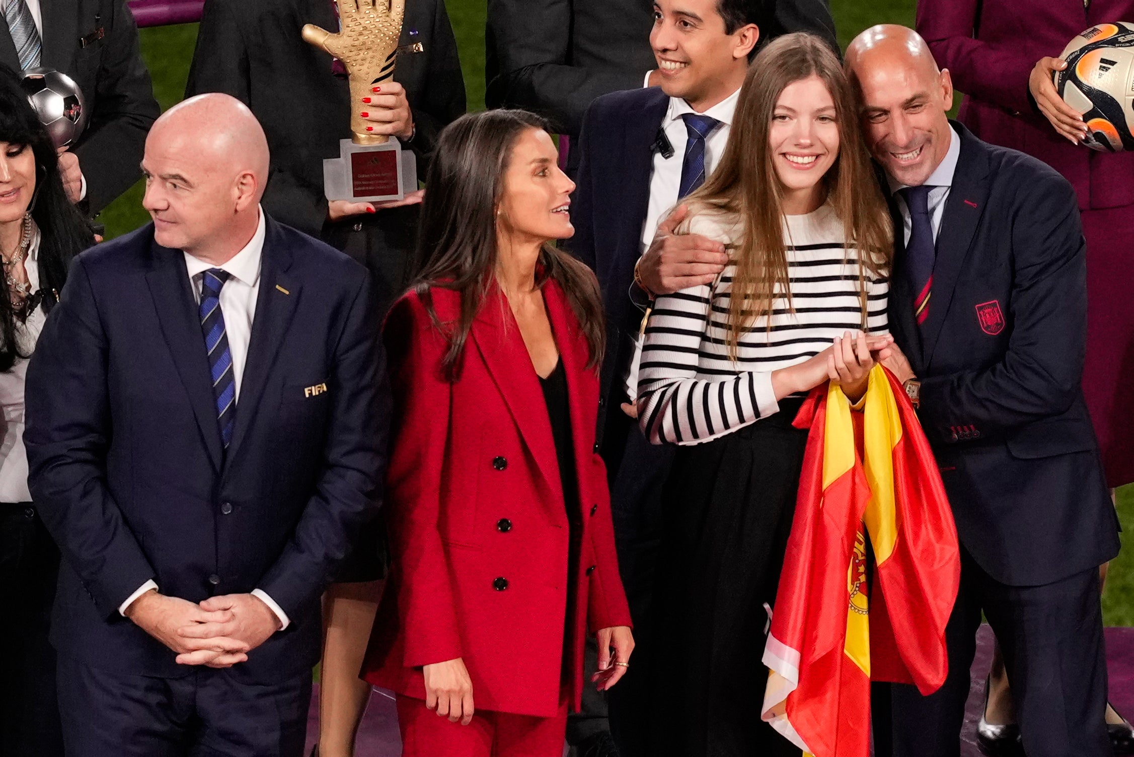 Luis Rubiales, right, embraces Spain’s Princess Infanta Sofia on the podium