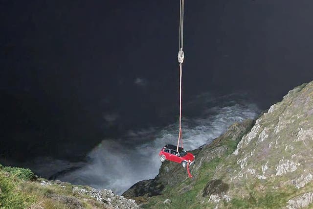 <p>The red mini was retrieved after the near-death plunge </p>