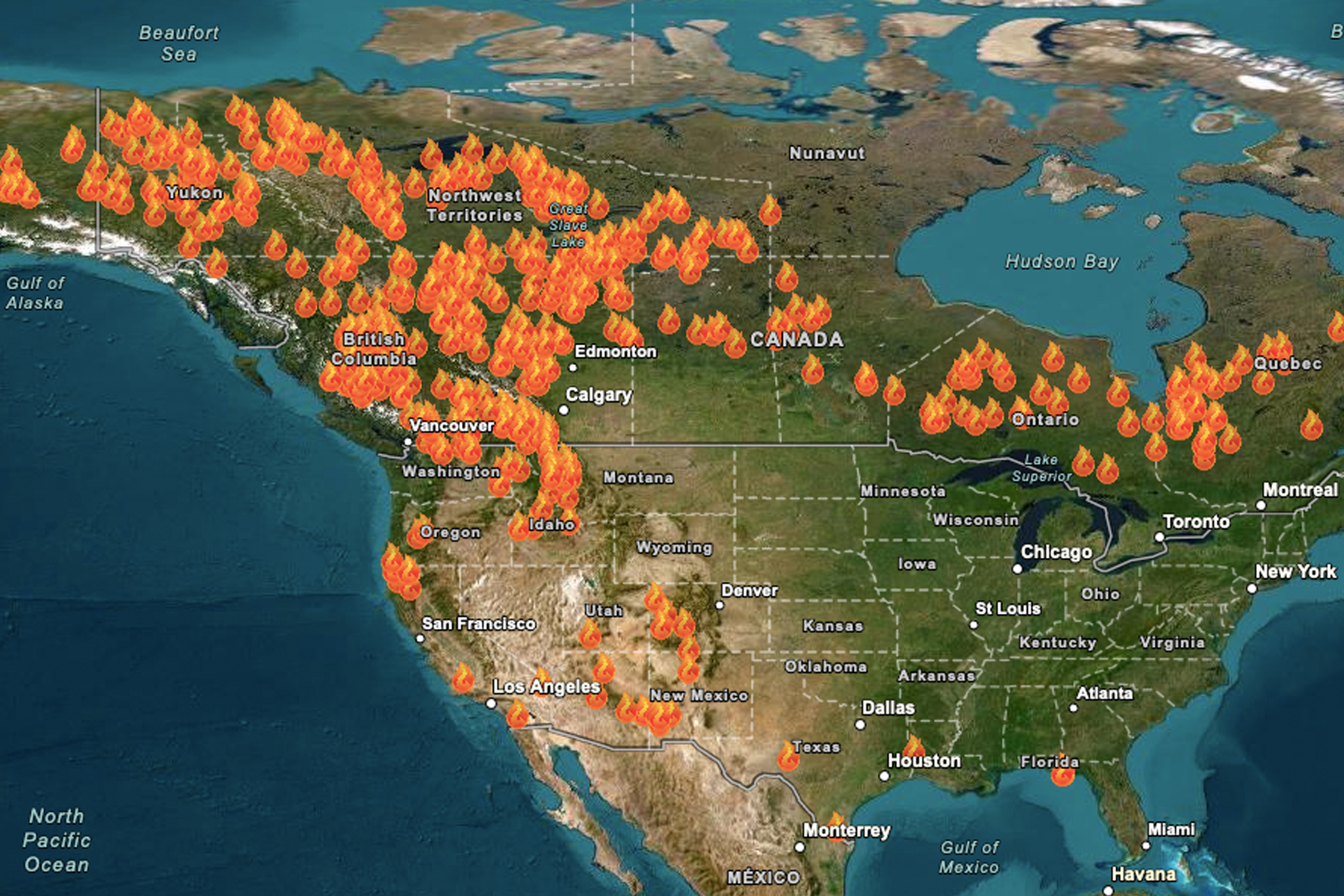 A map shows the number of wildfires burning across the US and Canada on Monday