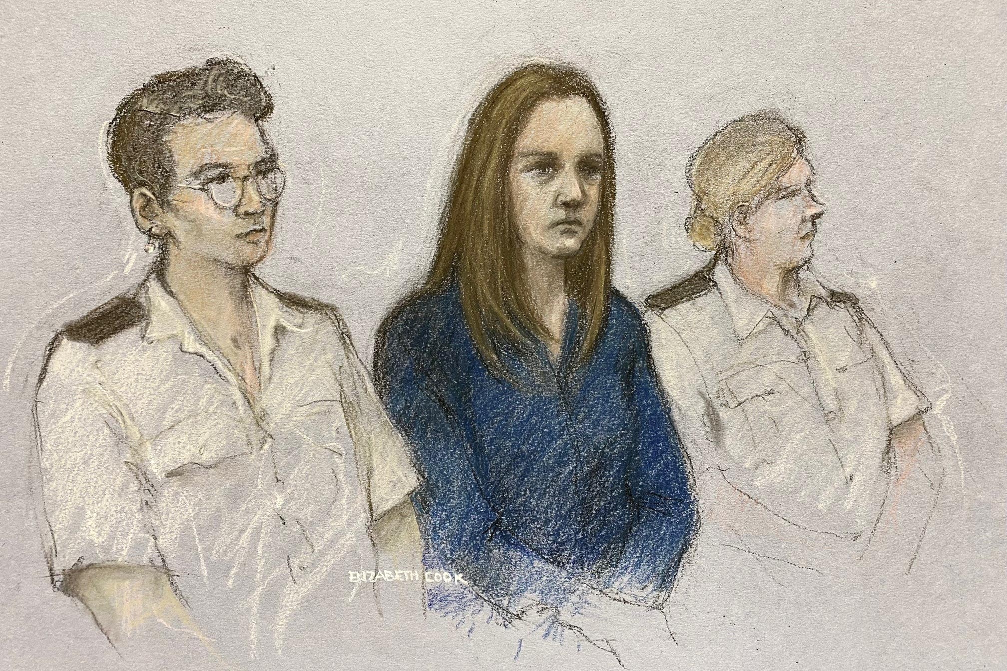 A court sketch of Lucy Letby (centre) listening to the verdicts being read at Manchester Crown Court