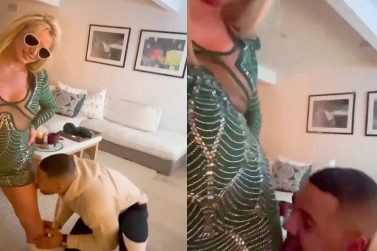 Britney Spears shares ‘bizarre’ video of mystery man licking her leg following Sam Asghari split | The Independent