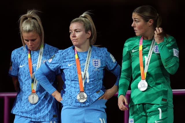 England’s Rachel Daly, Lauren Hemp and Mary Earps look dejected (Isabel Infantes/PA)