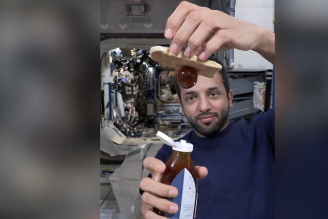 <p>Astronaut Sultan AlNeyadi shows how honey forms in zero gravity in space. </p>