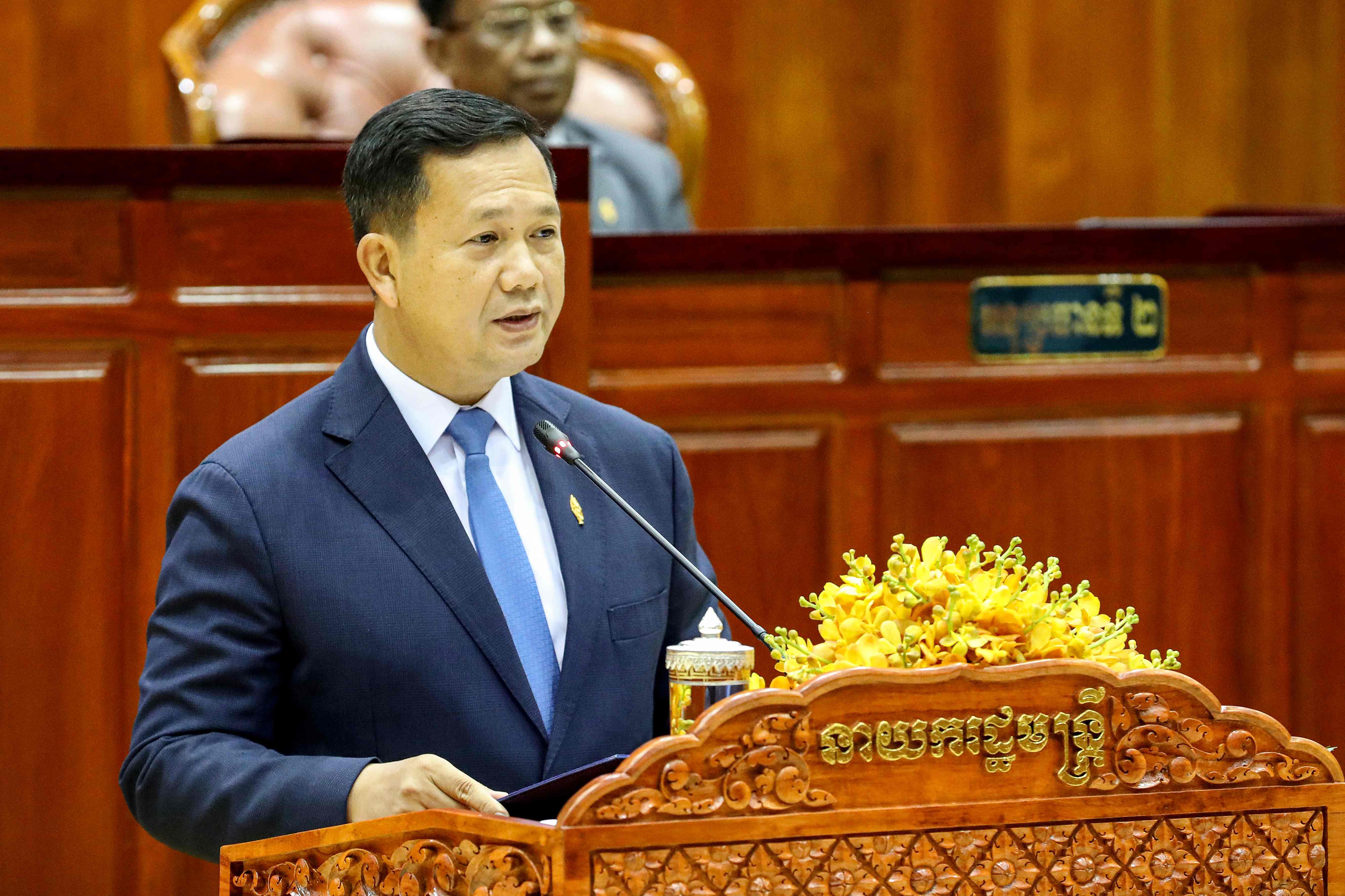 Cambodia’s Prime Minister Hun Manet delivering a speech during a parliamentary meeting at the National Assembly building