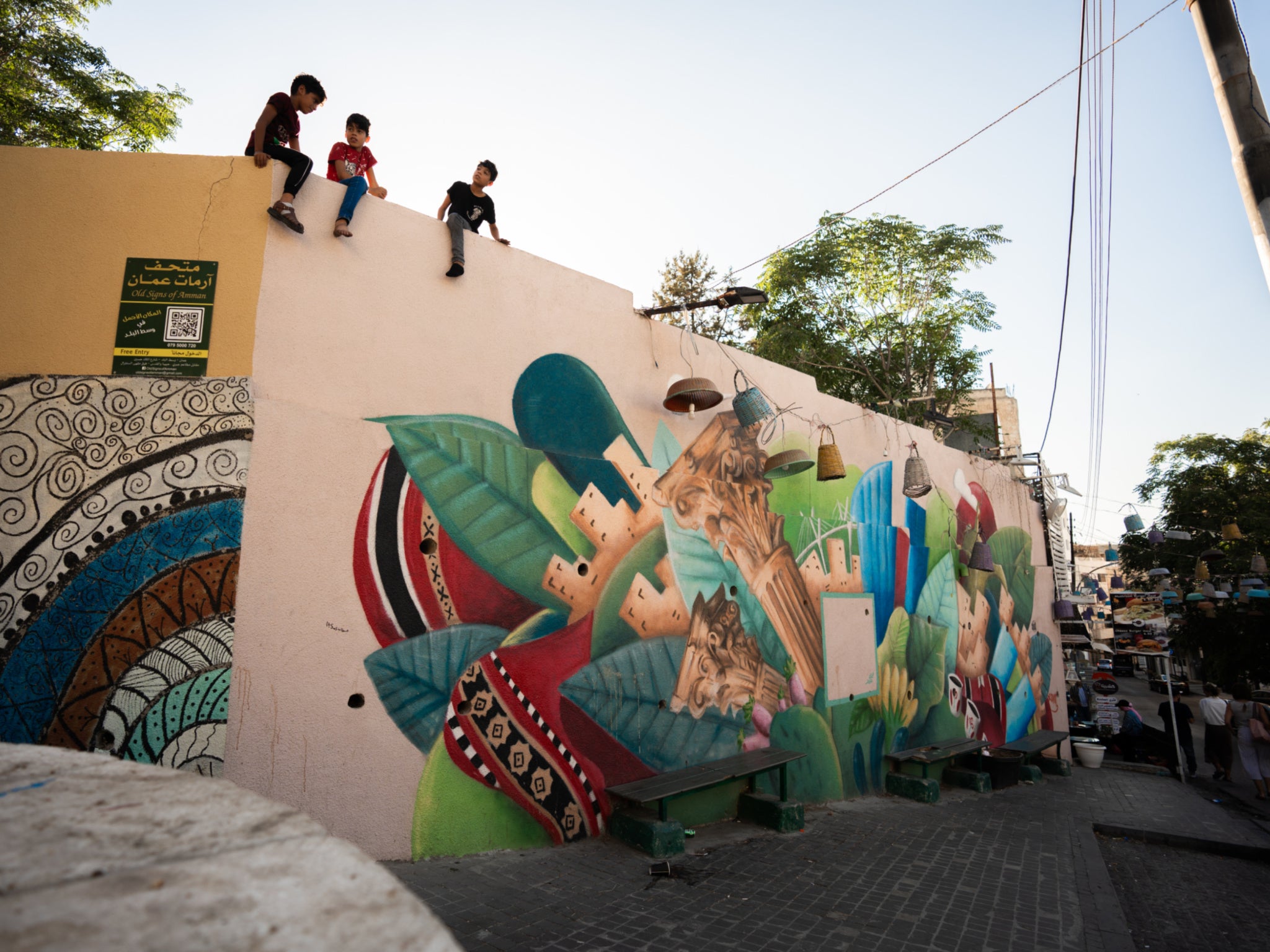 Many of Amman’s buildings are painted with colourful street art murals