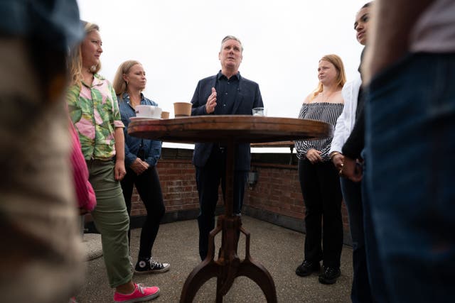 Labour leader Sir Keir Starmer speaks to residents about the impact of the cost-of-living crisis and rising mortgage rates during a visit to Worthing, West Sussex (Stefan Rousseau/PA)