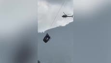 Moment Pakistan cable car rescue team winch child to safety captured in dramatic video footage