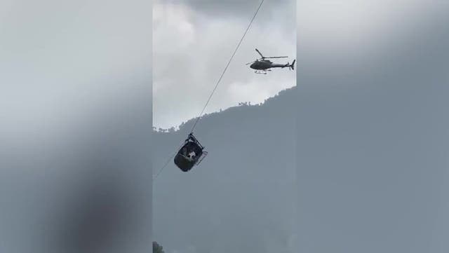 <p>Moment Pakistan cable car rescue team winch child to safety.</p>