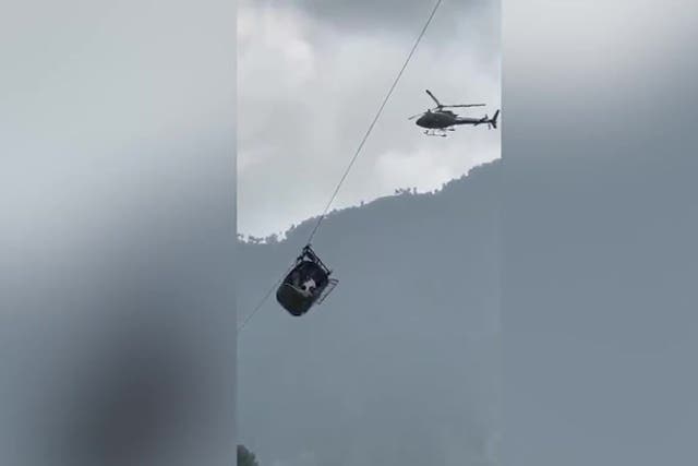 <p>Moment Pakistan cable car rescue team winch child to safety.</p>