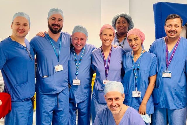 <p>The lead surgeons for Britain’s first womb transplant, including Professor Richard Smith (centre left) and consultant surgeon Isabel Quiroga (centre right)</p>