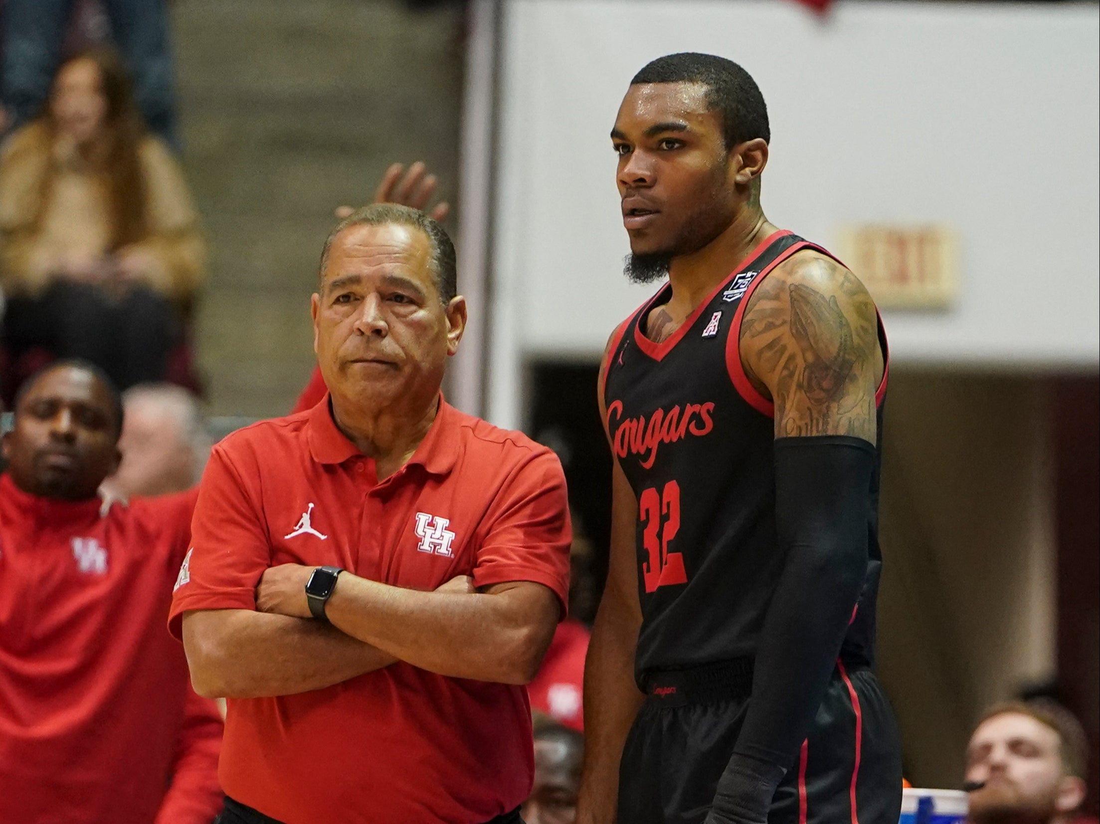 Reggie Chaney playing for the University of Houston Cougars in 2021. He is pictured here with head coach Kelvin Sampson