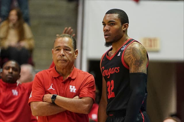 <p>Reggie Chaney playing for the University of Houston Cougars in 2021. He is pictured here with head coach Kelvin Sampson</p>