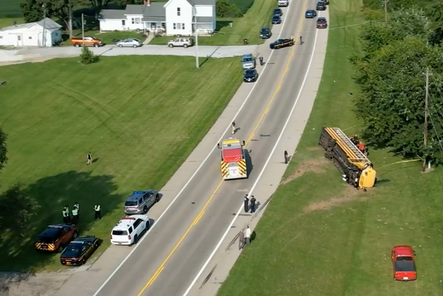 <p>A school bus in Clark County, Ohio, flipped over, killing a student, on 22 August 2023</p>