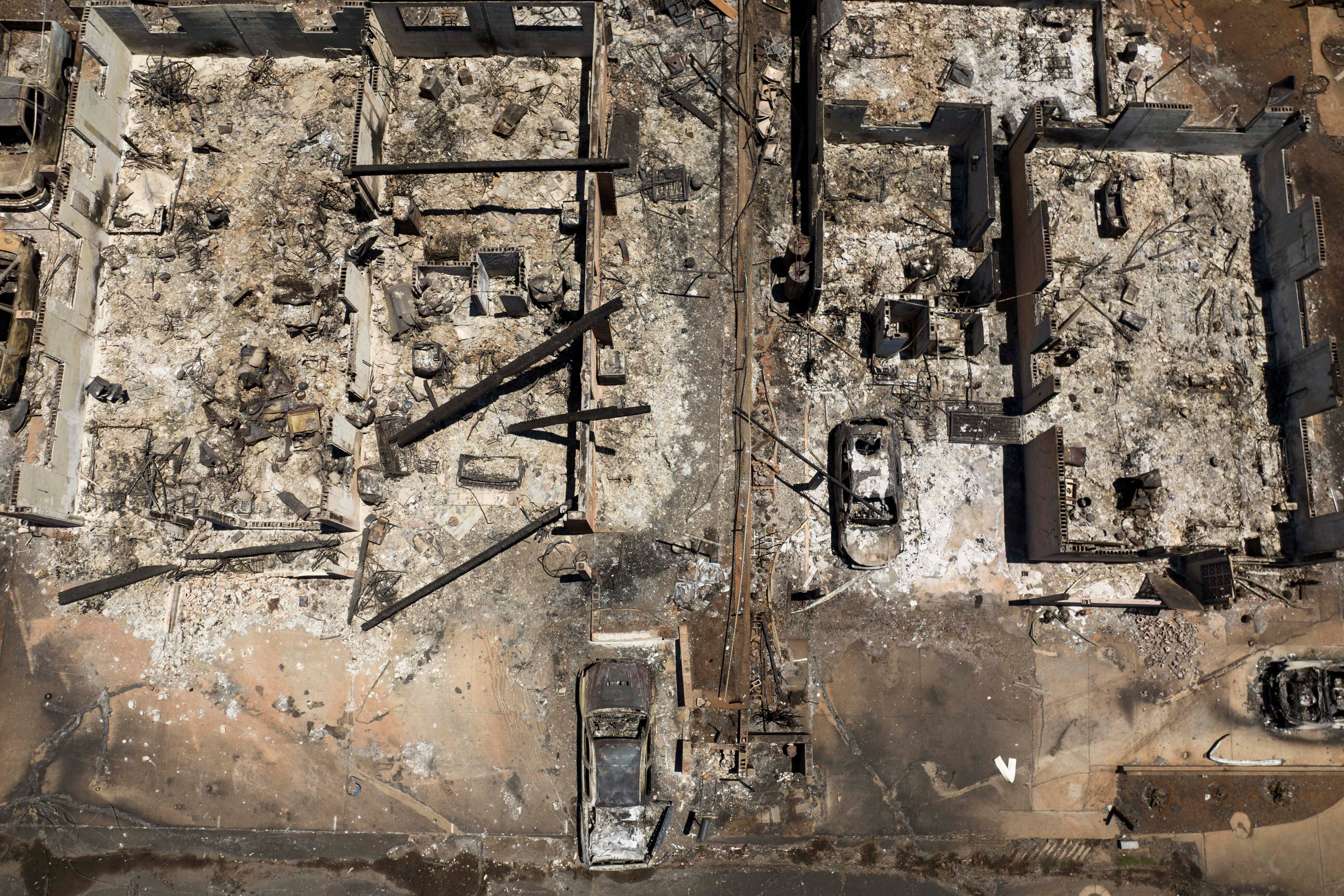 An aerial view shows the aftermath of a devastating wildfire in Lahaina, Hawaii on Tuesday, August 22, 2023