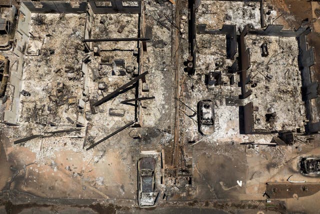 <p>An aerial view of the aftermath of a devastating wildfire in Lahaina, Hawaii </p>