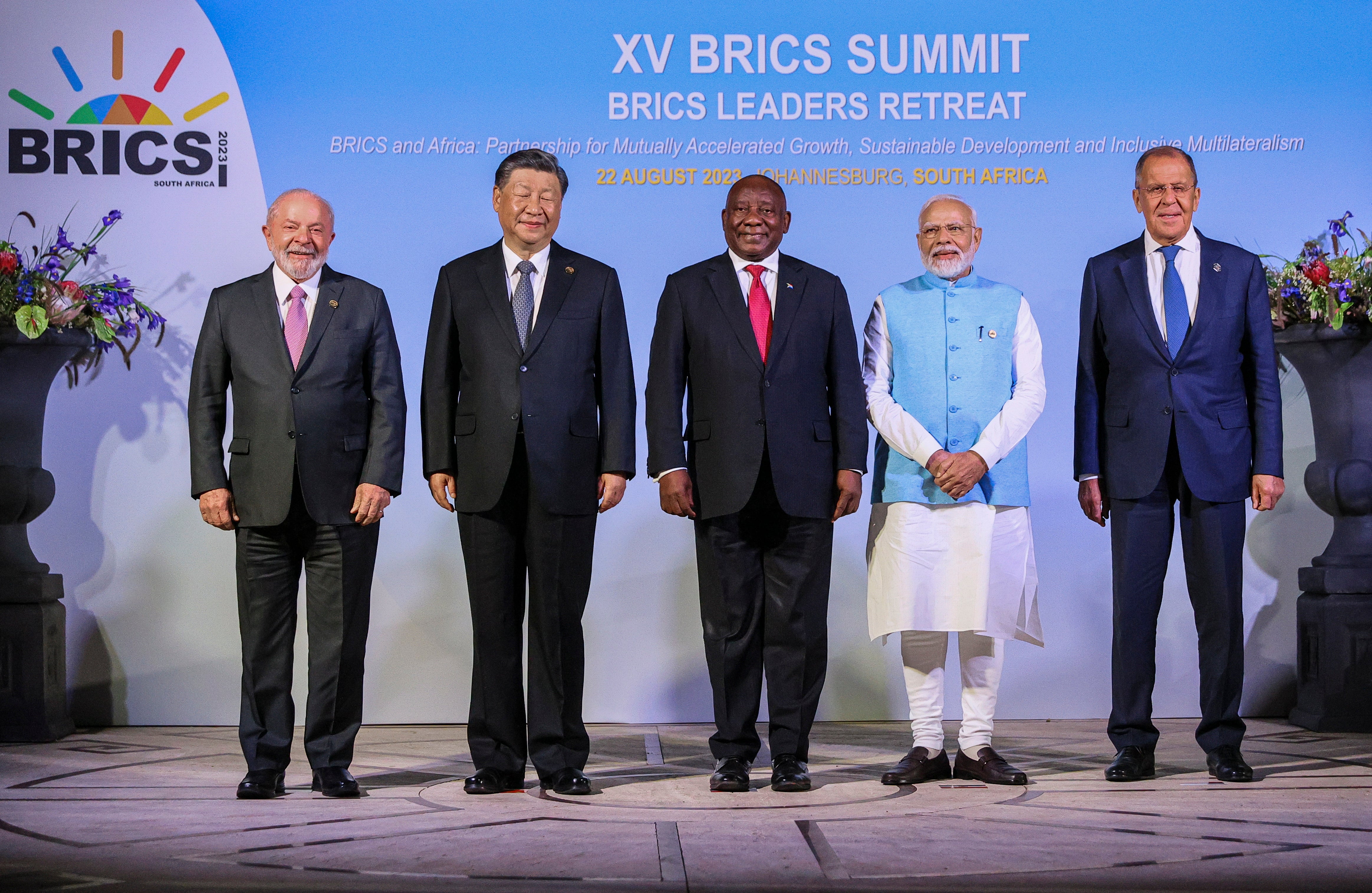 A handout photo made available by Russian Foreign Ministry Press Service shows Brazilian President Luiz Inacio Lula da Silva, Chinese President Xi Jinping, South African President Cyril Ramaphosa, Indian Prime Minister Narendra Modi and Russian Foreign Minister Sergey Lavrov