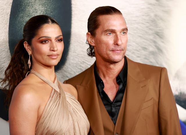 <p>Camila Alves and Matthew McConaughey attend the premiere of Illumination's "Sing 2" on December 12, 2021</p>