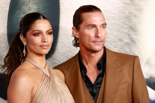 <p>Camila Alves and Matthew McConaughey attend the premiere of Illumination's "Sing 2" on December 12, 2021</p>