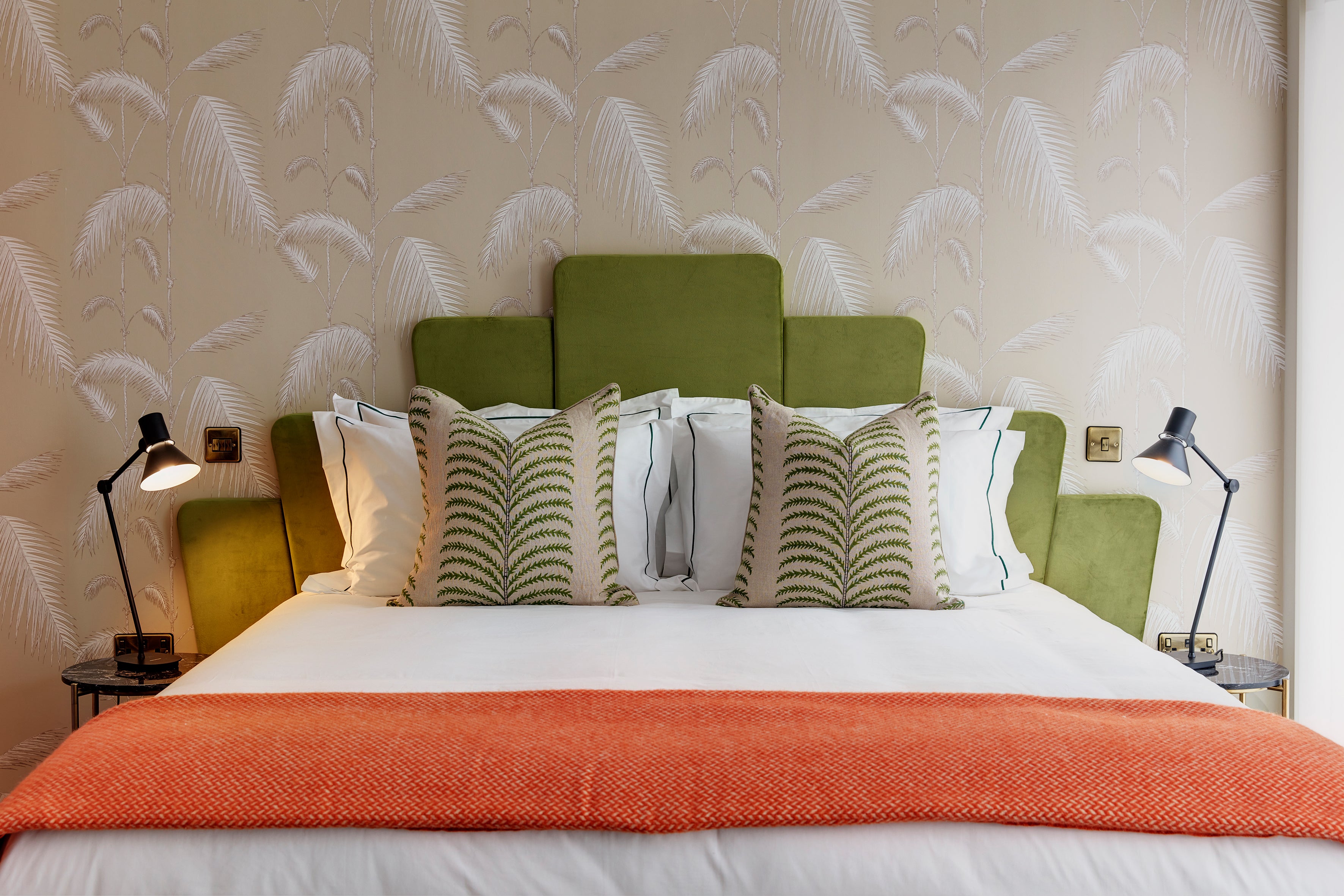 Apple-coloured flared panel headboards dress comfy double beds