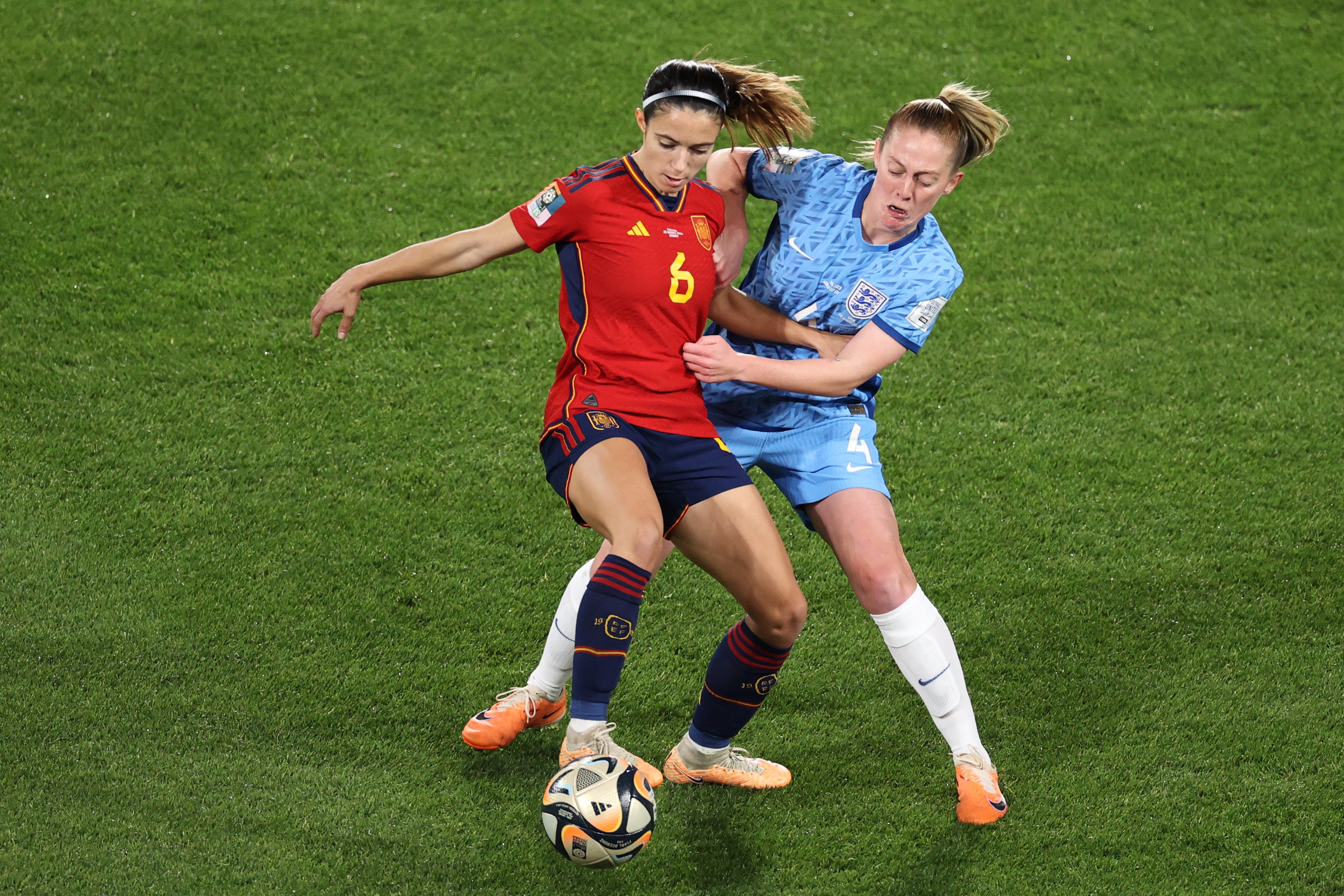 Aitana Bonmati of Spain shields the ball from England’s Keira Walsh