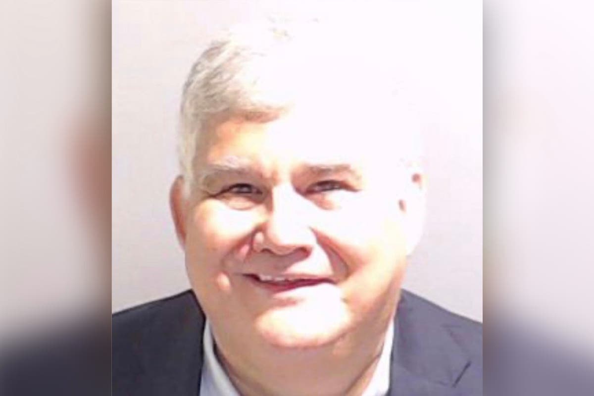 Trump codefendant posts smiling mugshot after surrendering to Fulton County Jail: &lsquo;New profile picture&rsquo;