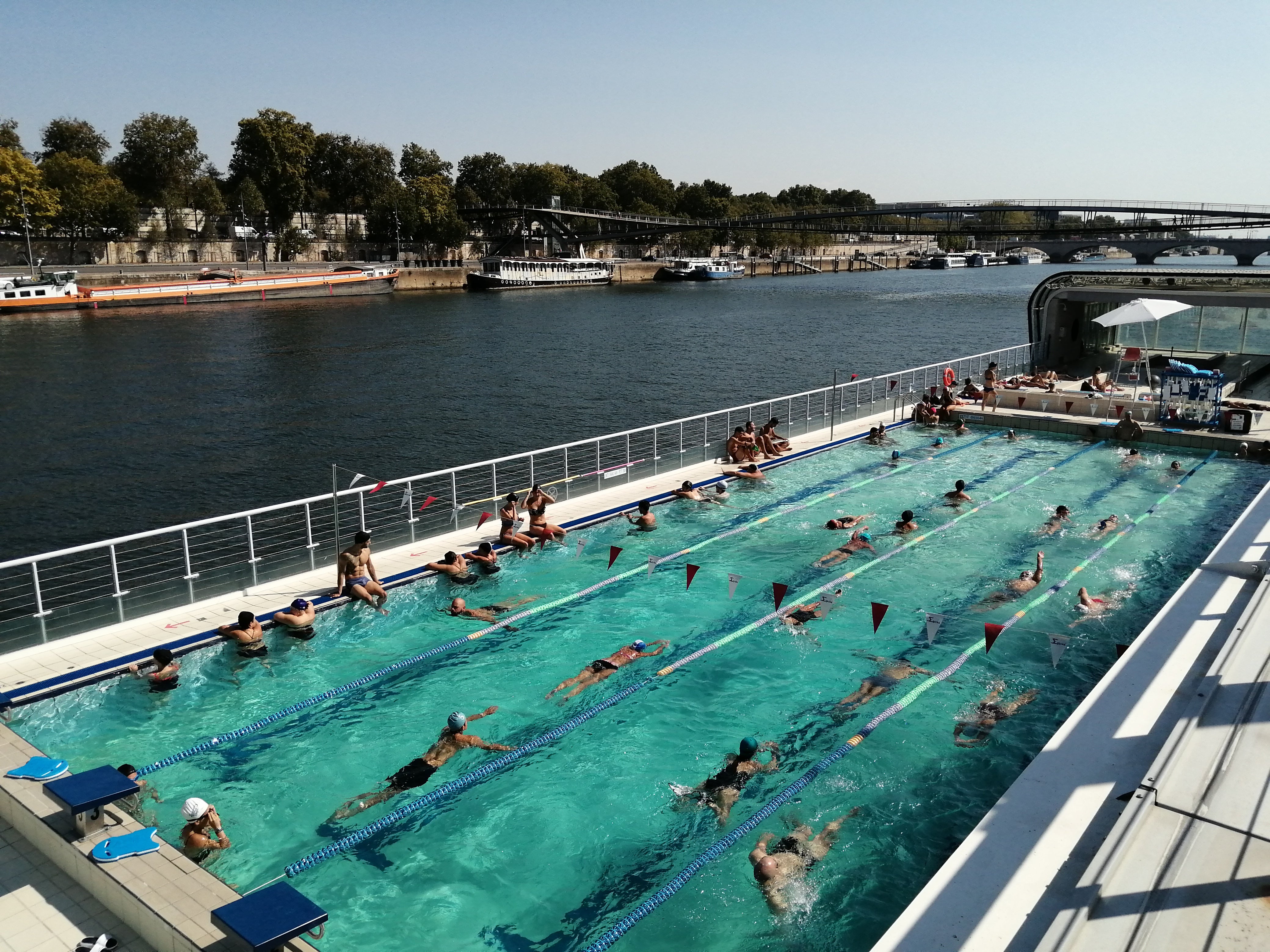 Visitors can swim by the Seine at the Josephine Baker pool in Paris