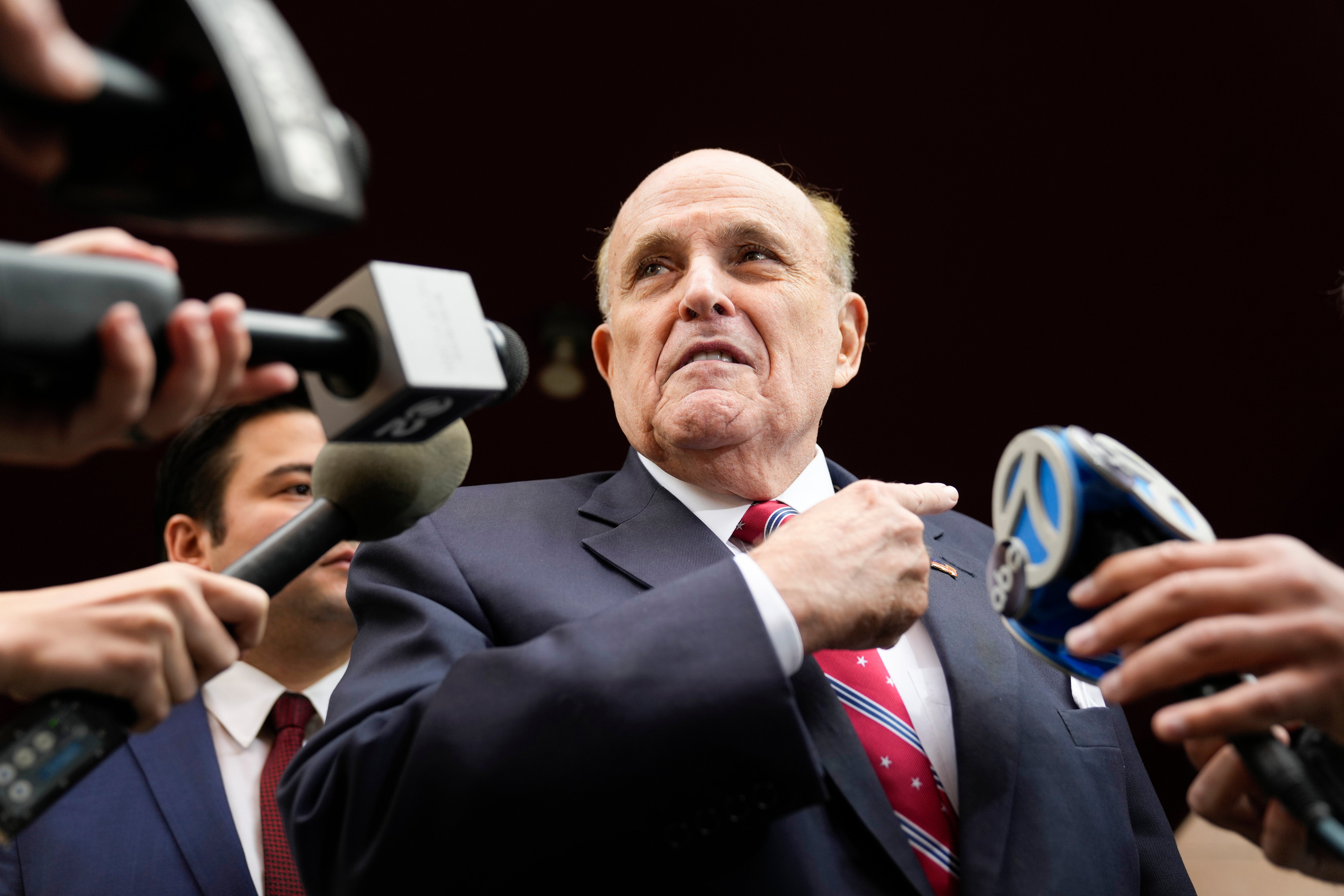 Rudy Giuliani as he left his apartment in New York on Wednesday to travel to Georgia