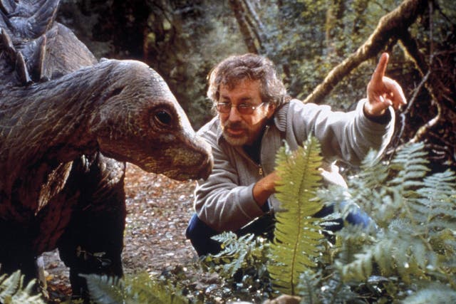 <p>Steven Spielberg behind the camera on set of ‘The Jurassic Park: Lost World’ in 1997</p>