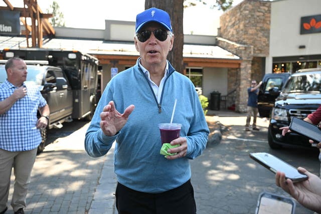 <p>President Joe Biden speaks to reporters after taking a pilates class followed by a spin class with First Lady Jill Biden and members of their family in South Lake Tahoe, California on 23 August 2023</p>
