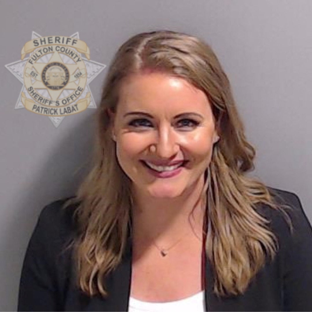 Trump attorney Jenna Ellis is shown in a police booking mugshot released by the Fulton County Sheriff's Office