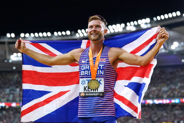Great Britain’s Josh Kerr celebrates his 1500m title (Martin Rickett/PA)
