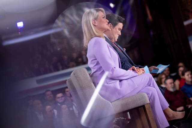 <p>Bret Baier and Martha MacCallum wait for US President Donald Trump during a FOX News Channel town hall at the Scranton Cultural Center March 5, 2020, in Scranton, Pennsylvania</p>