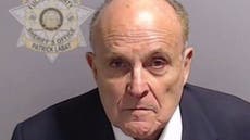 Rudy Giuliani poses for mugshot in Georgia ahead of Trump surrender in 2020 election case