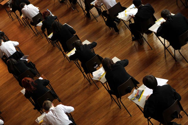 Hundreds of thousands of pupils in England, Wales and Northern Ireland are receiving their grades (David Davies/PA)