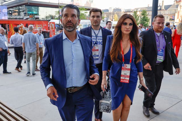 <p>Donald Trump Jr and his partner Kimberly Guilfoyle mingle with attendees</p>