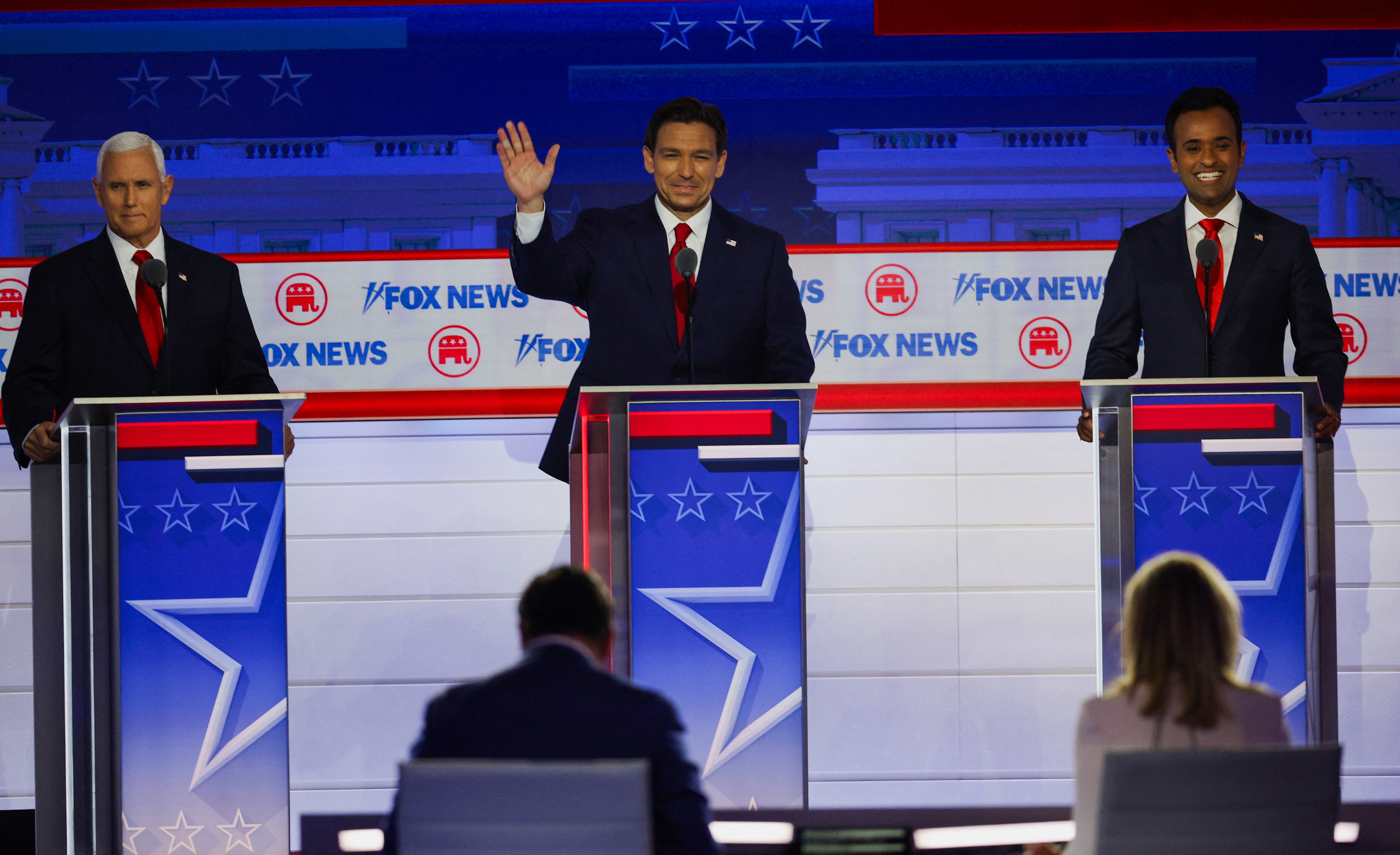 <p>Former U.S. Vice President Mike Pence, Florida Governor Ron DeSantis and businessman Vivek Ramaswamy participate in the first Republican candidates' debate of the 2024 U.S. presidential campaign in Milwaukee, Wisconsin</p>