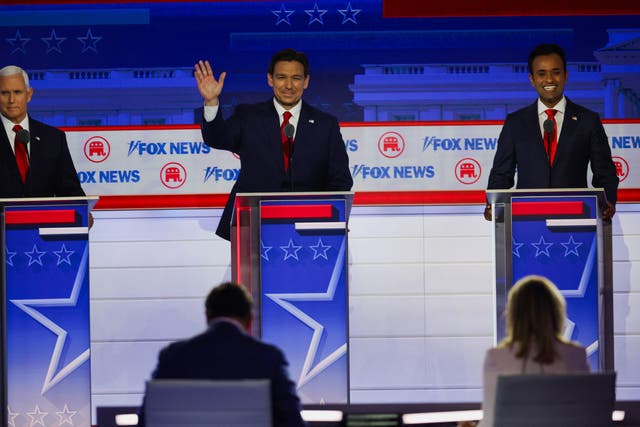 <p>Former U.S. Vice President Mike Pence, Florida Governor Ron DeSantis and businessman Vivek Ramaswamy participate in the first Republican candidates' debate of the 2024 U.S. presidential campaign in Milwaukee, Wisconsin</p>