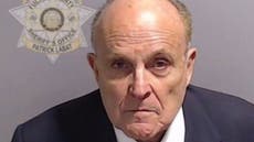 Watch: Rudy Giuliani’s chaotic reaction to being booked in Georgia election probe