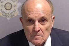 Watch: Rudy Giuliani’s chaotic reaction to being booked in Georgia election probe