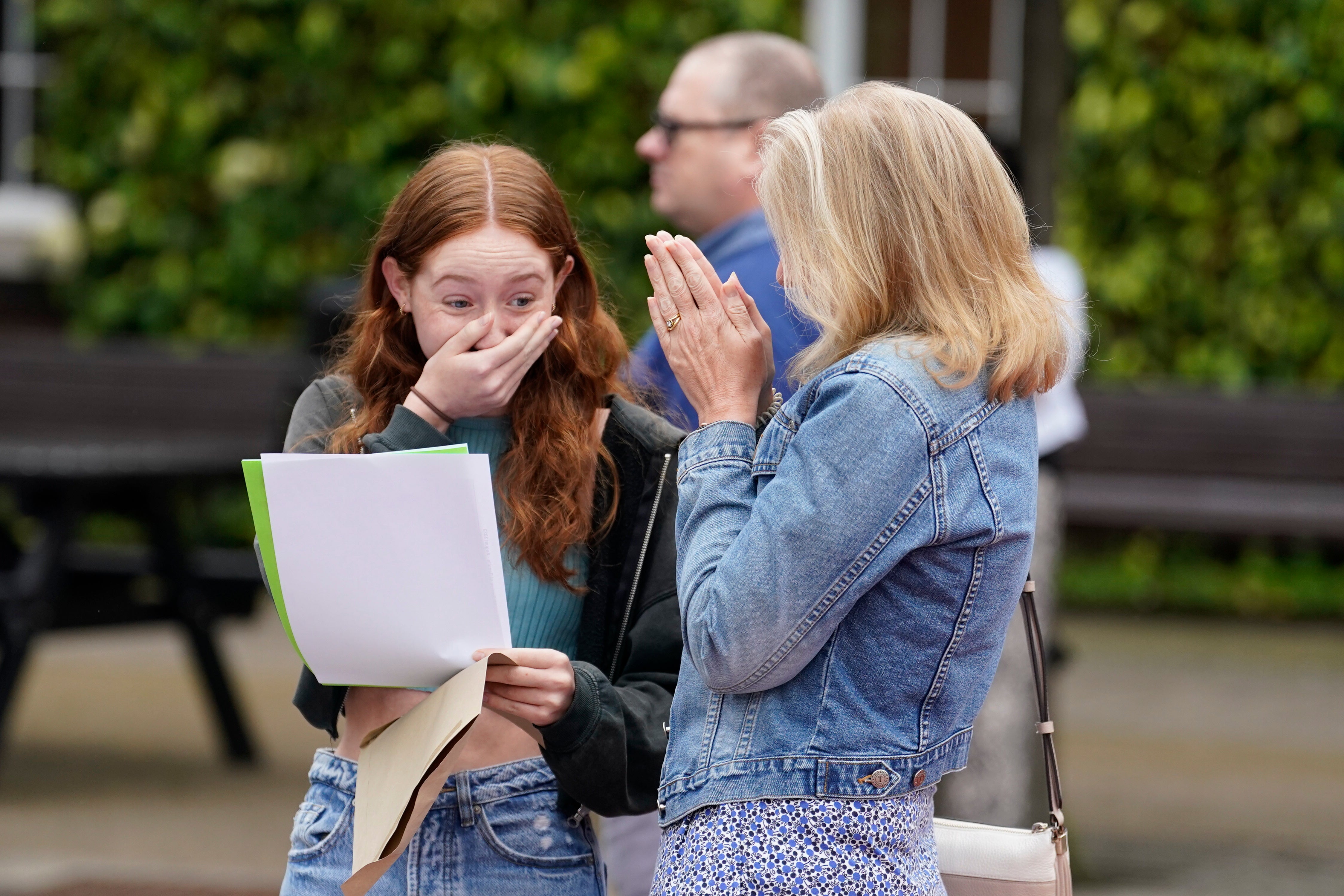 Annabel Bolton receiving her GCSE results with her mother Helen at Portsmouth Grammar School, in Hampshire.