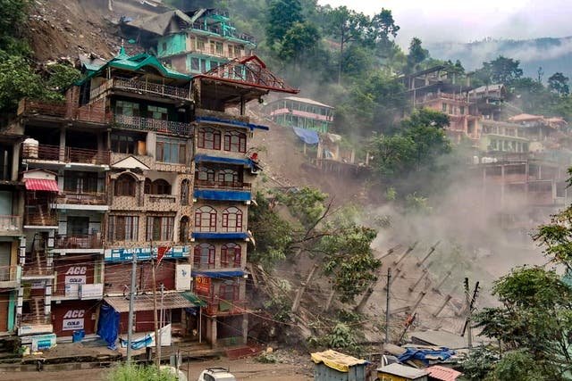<p>Several buildings collapse after massive landslides following heavy rainfall at Kullu’s Anni town, in India’s Himachal Pradesh state on 24 August</p>